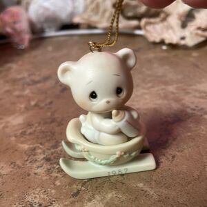 1987 “Bear the Good News of Christmas “ miniature ornament figurine.